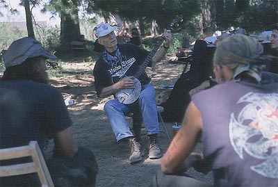 Banjo Fred performs at Black Butte camp