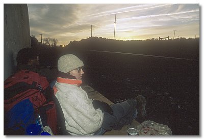 Dan and Kari waiting for train at sunset