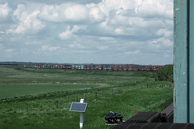 view of doublestack train on prairie